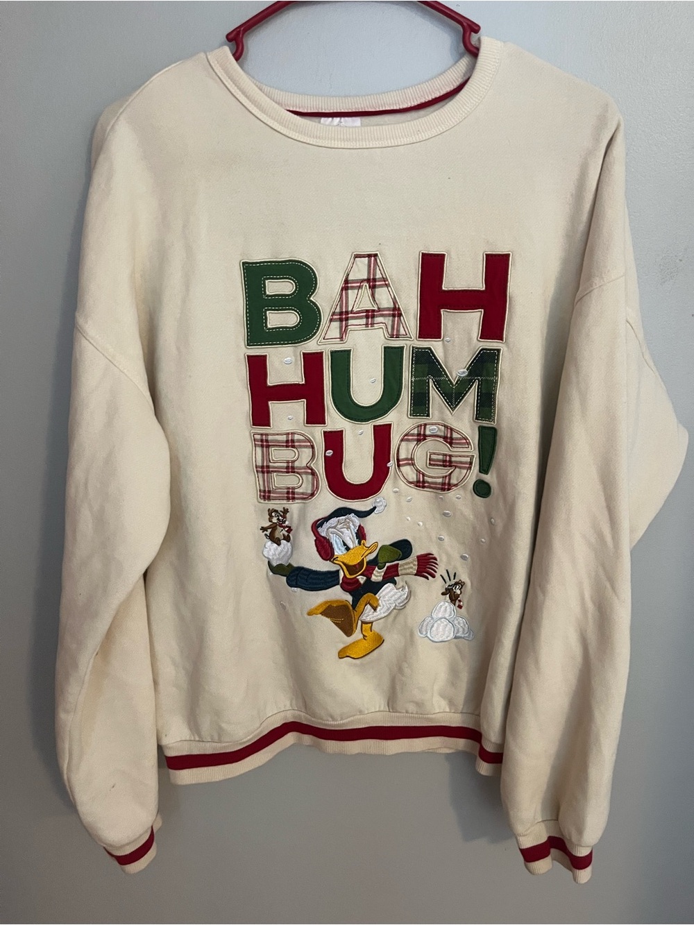 Disney Cream Crewneck Sweater with Donald Duck Holiday Graphic